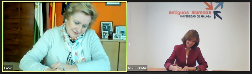 Firmando convenio alumni UMA
